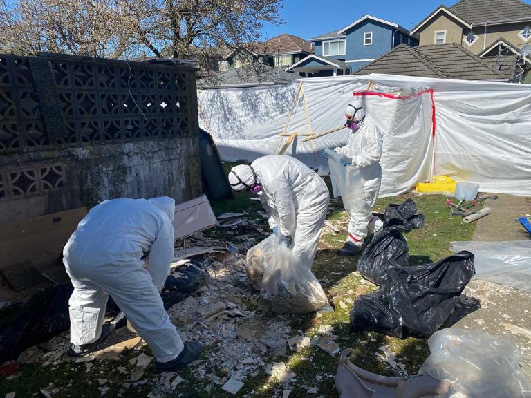 Rock Demolition asbestos removal team are working in a house in Burnaby